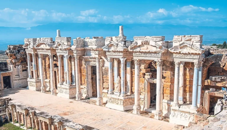 Marble columns and carved stage building of the ancient theatre in Hierapolis
