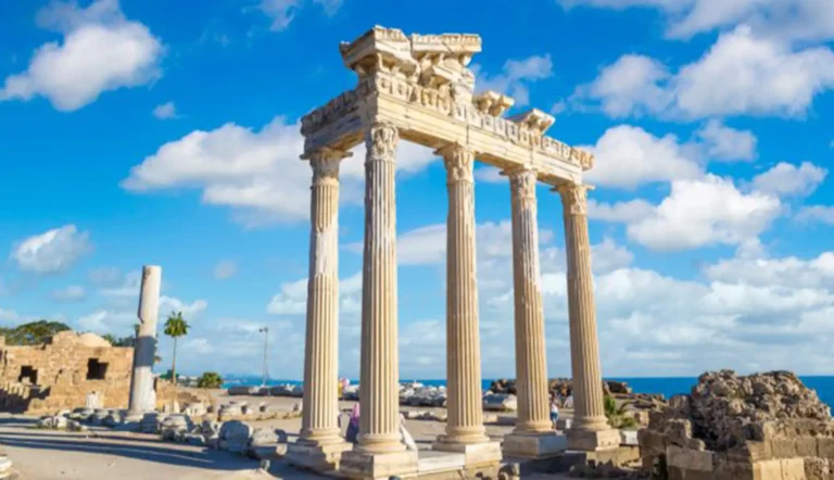 Marble columns of the Temple of Apollo in Side under a blue sky